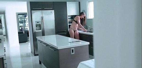  Stepson gets an eyeful as stepmom stands at the sink!
